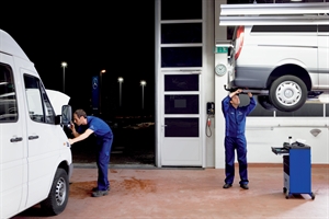 mechanics repairing vehicles