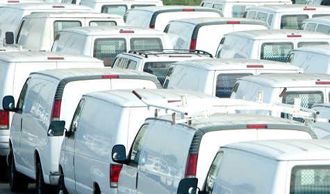big fleet of white vans